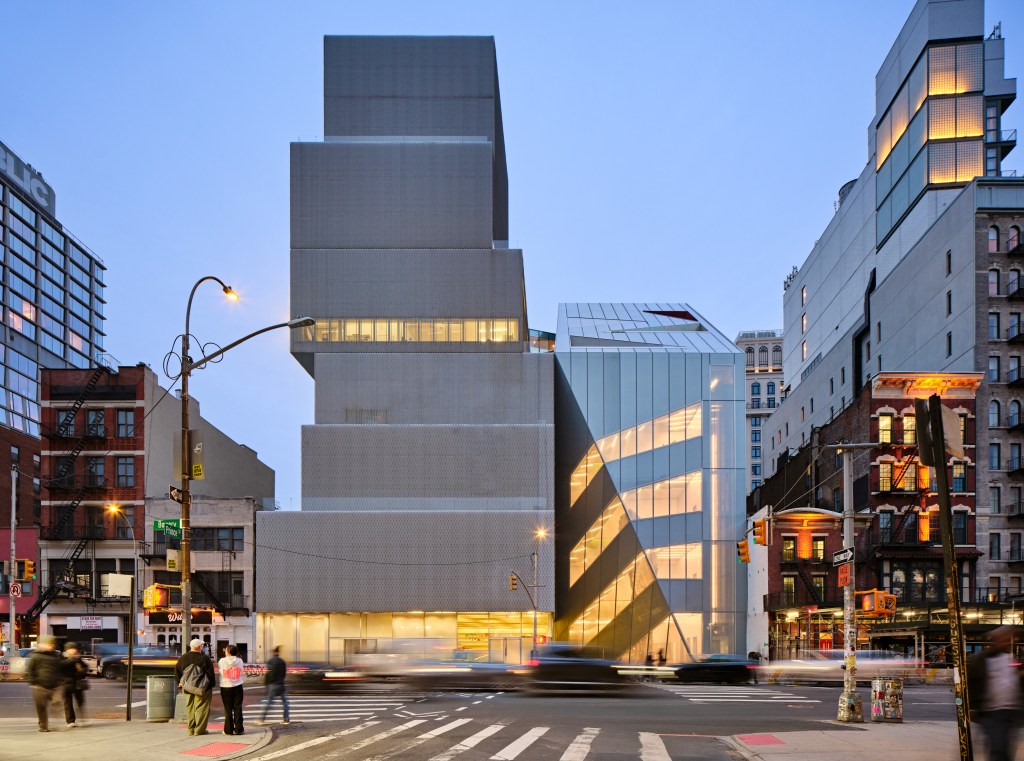 The New Museum and its new addition on the Bowery at dusk